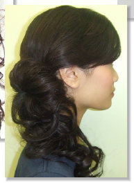 curly side pony tail